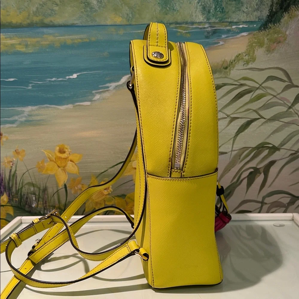 Henri Bendel West 57th Yellow Saffiano Leather Backpack with Colorful Tassels